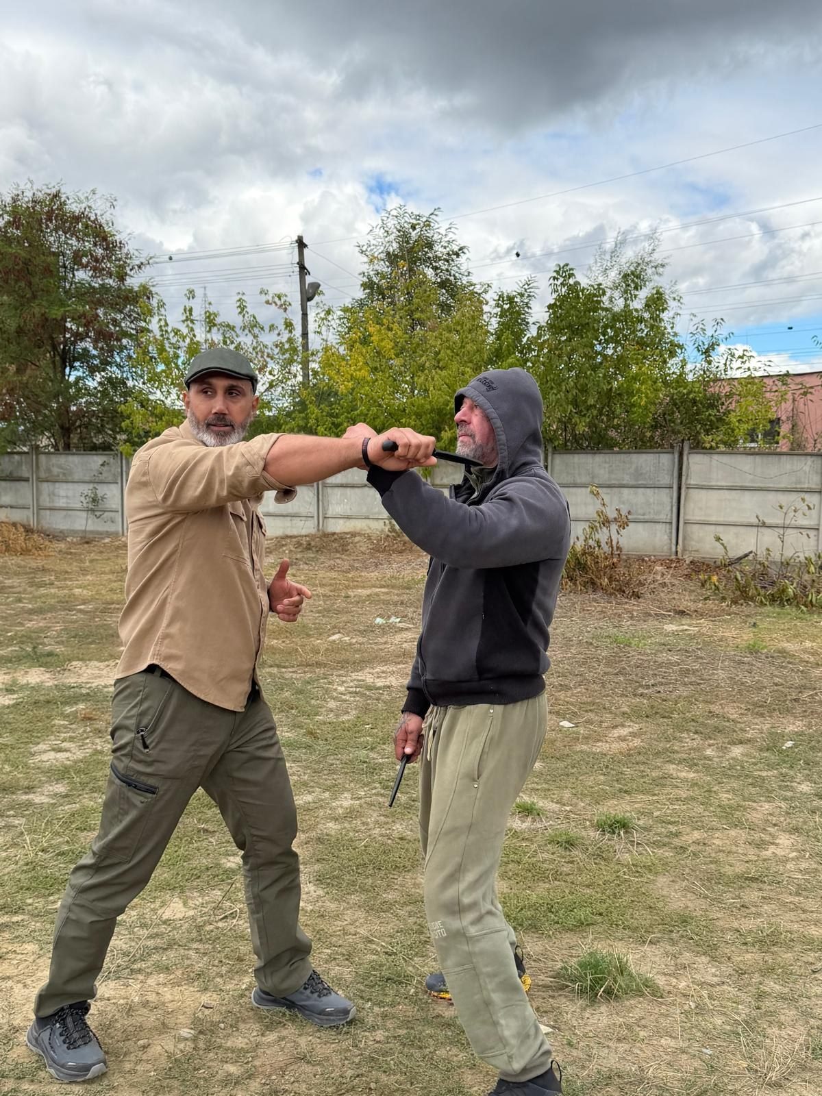 Instructor demonstrating defence against a knife
